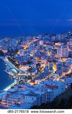 Albania, Albanian Riviera, Saranda, elevated city view, dusk. View Large Photo Image Stock Photo - Albania, Albanian Riviera, Saranda, elevated city view, dusk.. Fotosearch