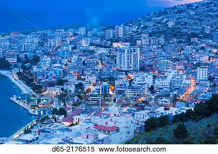 Albania, Albanian Riviera, Saranda, elevated city view, dusk. View Large Photo Image Stock Photography - Albania, Albanian Riviera, Saranda, elevated city view, dusk.. Fotosearch