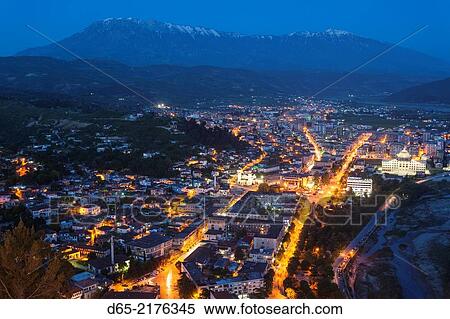 Stock Photography - Albania, Berat, elevated city view, dusk.. Fotosearch
