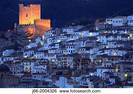 Stock Photograph - AlcalB del Jucar view at dusk. Albacete.. Fotosearch