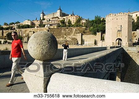 Alcantara bridge and Alcazar, Toledo. Castilla-La Mancha, Spain View Large Photo Image Stock Photo - Alcantara bridge and Alcazar, Toledo. Castilla-La Mancha, Spain. Fotosearch