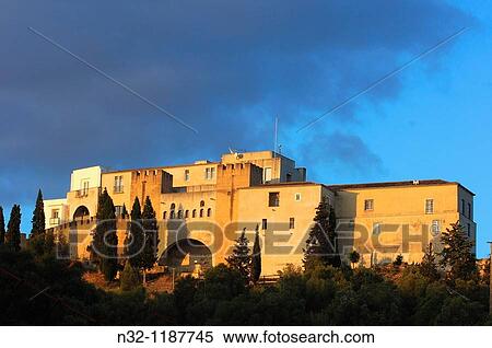 Stock Photography - AlcBcer do Sal, Castle now hotel-pousada at sunset, SetubaL district, Alentejo, Portugal, Europe.. Fotosearch