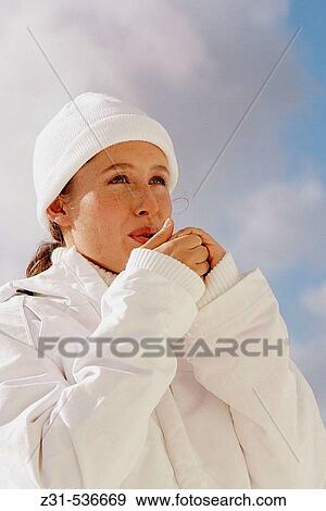 Stock Photo - Alice, Warm clothes, White, Heating, Hands. Fotosearch