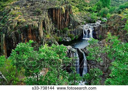 Aljibe waterfall. Arroyo del Soto. Sierra Norte. Castile-La Mancha. Spain. View Large Photo Image Picture - Aljibe waterfall. Arroyo del Soto. Sierra Norte. Castile-La Mancha. Spain.. Fotosearch