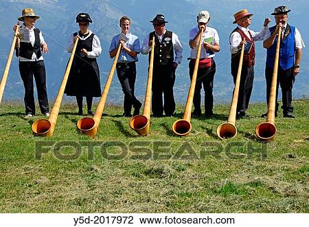 alphorn players, Nendaz, Valais, Switzerland. View Large Photo Image Stock Image - alphorn players, Nendaz, Valais, Switzerland.. Fotosearch