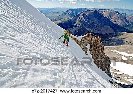 alpine climbing The North Face on Borah Peak a route which is rated Grade 3, AI-3 and located on Mount Borah in the Lost River Mountains in central Idaho. View Large Photo Image Stock Photo - alpine climbing The North Face on Borah Peak a route which is rated Grade 3, AI-3 and located on Mount Borah in the Lost River Mountains in central Idaho.. Fotosearch