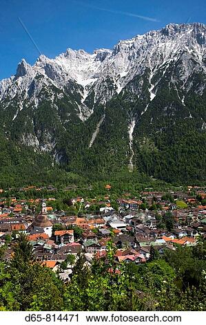 Alpine town with Karwendel Mountains, Mittenwald, Bavaria, Germany View Large Photo Image Stock Image - Alpine town with Karwendel Mountains, Mittenwald, Bavaria, Germany. Fotosearch