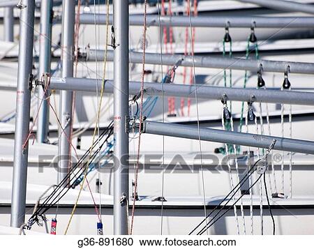 Aluminum masts of sail boats make pattern in harbor of Santa Barbara, California, United States of America View Large Photo Image Stock Image - Aluminum masts of sail boats make pattern in harbor of Santa Barbara, California, United States of America. Fotosearch