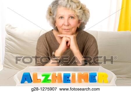Alzheimer concept, senior woman sitting behind colored letters, spelling Halzheimer View Large Photo Image Stock Photo - Alzheimer concept, senior woman sitting behind colored letters, spelling Halzheimer. Fotosearch