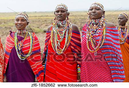 Amboseli National Park Kenya Africa safari Masai women welcome to village Amboseli Maasai, beads, red, color, line, smile, jump, 1 View Large Photo Image Stock Image - Amboseli National Park Kenya Africa safari Masai women welcome to village Amboseli Maasai, beads, red, color, line, smile, jump, 1. Fotosearch