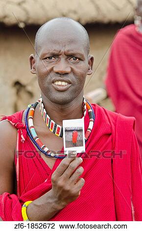 Amboseli National Park Kenya Africa safari Masai men showing photo polaroid in village Amboseli Maasai, beads, red, color, fun, 1 View Large Photo Image Stock Image - Amboseli National Park Kenya Africa safari Masai men showing photo polaroid in village Amboseli Maasai, beads, red, color, fun, 1. Fotosearch