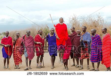 Amboseli National Park Kenya Africa safari Masai men welcome to village Amboseli Maasai, beads, red, color, line, smile, jump View Large Photo Image Stock Photo - Amboseli National Park Kenya Africa safari Masai men welcome to village Amboseli Maasai, beads, red, color, line, smile, jump. Fotosearch