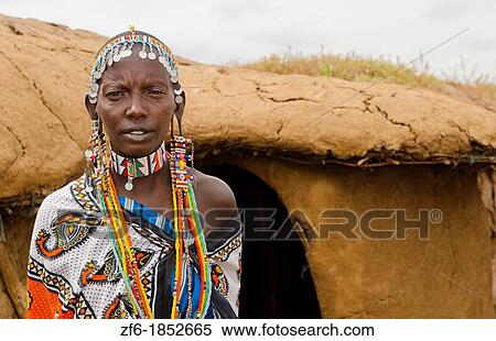 Amboseli National Park Kenya Africa safari Masai woman welcome to village Amboseli Maasai, hut, mud, home, beads, red, color, 1 View Large Photo Image Stock Photography - Amboseli National Park Kenya Africa safari Masai woman welcome to village Amboseli Maasai, hut, mud, home, beads, red, color, 1. Fotosearch