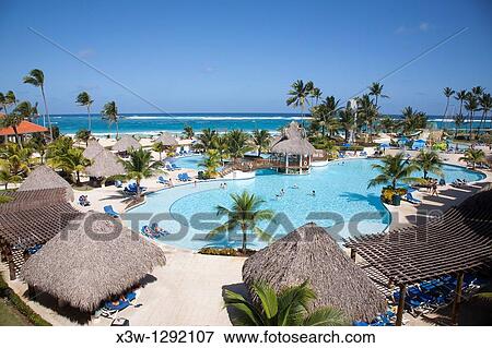 america, caribbean sea, hispaniola island, dominican republic, punta cana, hotel barcelo punta cana, swimming pool View Large Photo Image Stock Photo - america, caribbean sea, hispaniola island, dominican republic, punta cana, hotel barcelo punta cana, swimming pool. Fotosearch