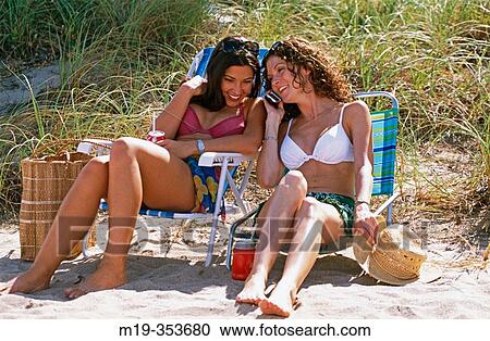 American and columbian friends on the beach View Large Photo Image Stock Image - American and columbian friends on the beach. Fotosearch