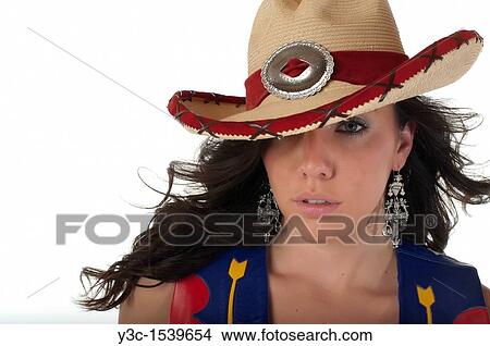 Picture - American Beauty - Portrait of beautiful woman in cowgirl outfit. Fotosearch