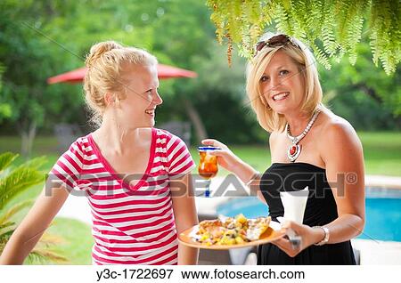 Stock Photo - American family backyard barbecue. Fotosearch
