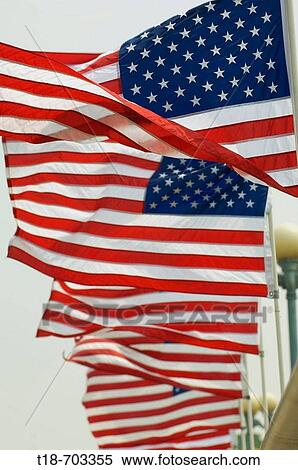 American flag blowing View Large Photo Image Stock Photography - American flag blowing. Fotosearch