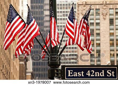 American flags, East 42nd St, Manhattan, New York, New York City, USA. View Large Photo Image Stock Photo - American flags, East 42nd St, Manhattan, New York, New York City, USA.. Fotosearch