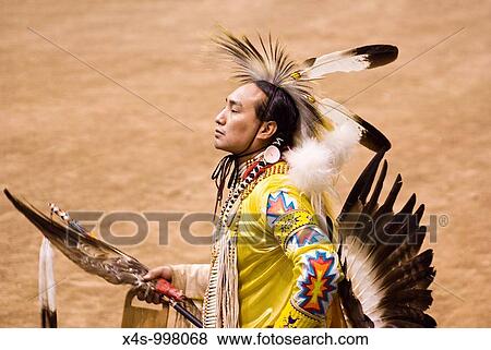 American Lakota Indian warrior in traditional ceremonial oufit at pow-wow View Large Photo Image Stock Photo - American Lakota Indian warrior in traditional ceremonial oufit at pow-wow. Fotosearch
