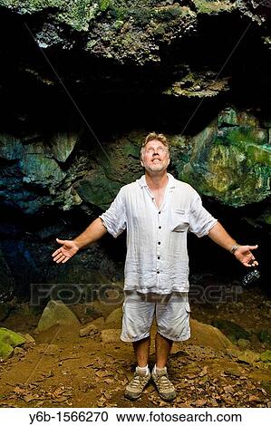 American tourist in a cave on Easter Island View Large Photo Image Stock Image - American tourist in a cave on Easter Island. Fotosearch