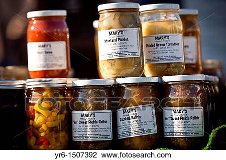 Stock Image - Amish made pickles at the Annual Mud Sale to support the Fire Department in Gordonville, PA. Fotosearch