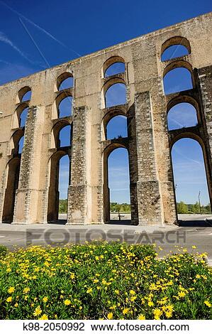 Stock Image - Amoreira aqueduct (16th-17th c. ), national monument, freguesia de Sao Bras e Sao Louren? o, Elvas municipality, Alentejo, Portugal. Fotosearch