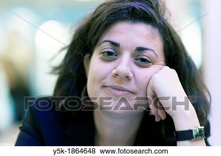 Amsterdam Airport, Amsterdam, Netherlands. Young Italian woman during a conversation. View Large Photo Image Stock Photo - Amsterdam Airport, Amsterdam, Netherlands. Young Italian woman during a conversation.. Fotosearch