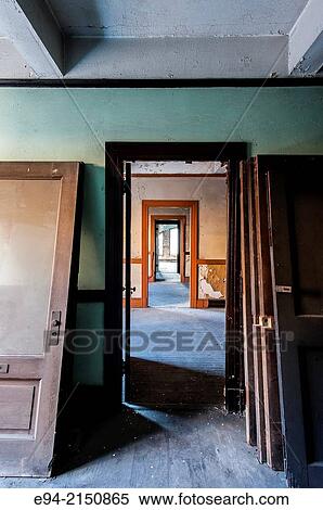 An abandoned office in an old building looking through doorways showing peeling paint on walls and ceiling. Birmingham, Alabama, USA View Large Photo Image Stock Photography - An abandoned office in an old building looking through doorways showing peeling paint on walls and ceiling. Birmingham, Alabama, USA. Fotosearch