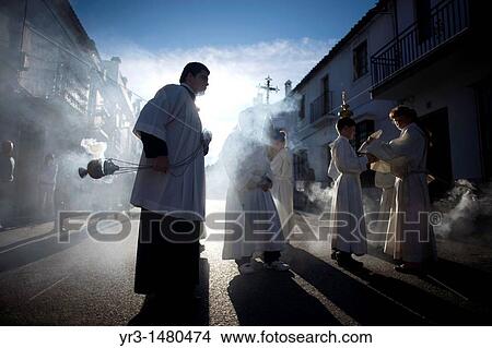 An acolyte spreads incense during an Easter Holy Week procession in Prado del Rey, Andalusia, Spain, April 24, 2011 View Large Photo Image Picture - An acolyte spreads incense during an Easter Holy Week procession in Prado del Rey, Andalusia, Spain, April 24, 2011. Fotosearch