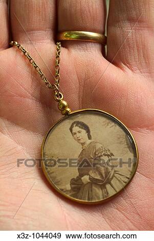 An antique photo frame on a gold chain circa 1860 View Large Photo Image Stock Photo - An antique photo frame on a gold chain circa 1860. Fotosearch