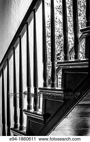 An architectural study of a wooden stairway in black & white View Large Photo Image Stock Image - An architectural study of a wooden stairway in black & white. Fotosearch