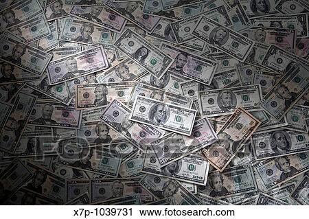 Stock Image - An arrangement of common American currency denominations. Fotosearch