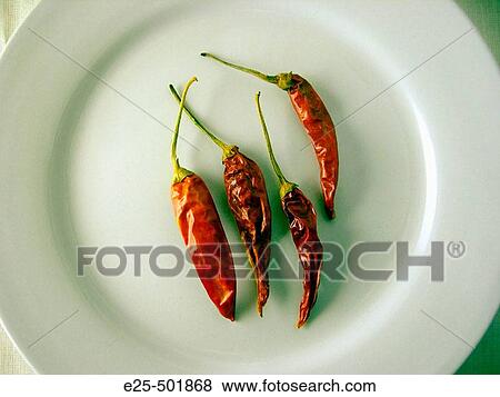 An Arrangement Of Dried Chilli Peppers View Large Photo Image Stock Photo - An Arrangement Of Dried Chilli Peppers. Fotosearch
