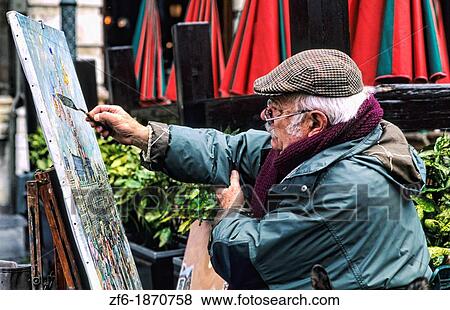 An artist painting painting in the beautiful Grand Place square with 16th Century buildings in Brussels Belgium Europe View Large Photo Image Stock Photo - An artist painting painting in the beautiful Grand Place square with 16th Century buildings in Brussels Belgium Europe. Fotosearch