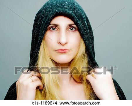 An attractive American woman with beautiful long, flowing blond hair, wearing a cape over her hair View Large Photo Image Picture - An attractive American woman with beautiful long, flowing blond hair, wearing a cape over her hair. Fotosearch