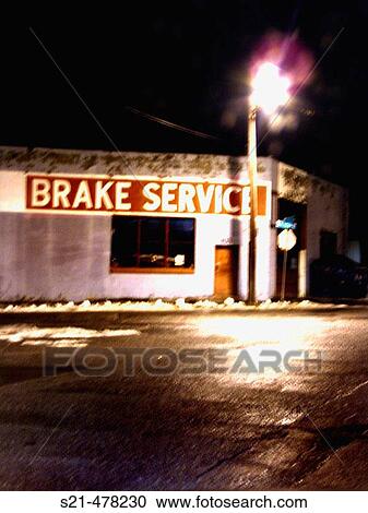 An automobile brake service shop in Albany, New York is captured at night with a slight blur. View Large Photo Image Stock Image - An automobile brake service shop in Albany, New York is captured at night with a slight blur.. Fotosearch