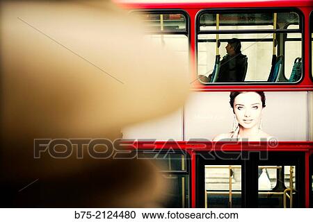An avert with the face of Miranda Kerr in a double decker bus through the streets in London, England, UK, Europe View Large Photo Image Stock Image - An avert with the face of Miranda Kerr in a double decker bus through the streets in London, England, UK, Europe. Fotosearch