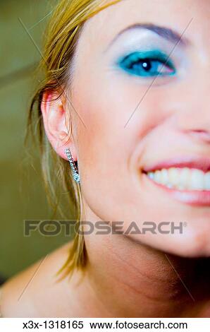 An earring on a woman ear View Large Photo Image Stock Photography - An earring on a woman ear. Fotosearch