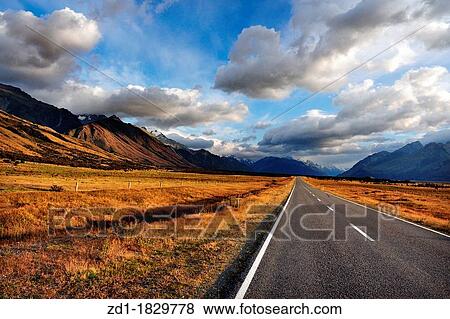 Stock Photo - An empty road in Mount Cook National Park, south Island, New Zealand. Fotosearch