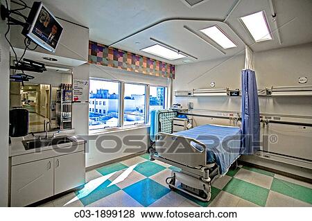 An empty room stands ready for a patient at a hospital in Orange, CA View Large Photo Image Stock Photo - An empty room stands ready for a patient at a hospital in Orange, CA. Fotosearch