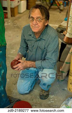 An experienced craftsman in his workshop. View Large Photo Image Stock Photo - An experienced craftsman in his workshop.. Fotosearch