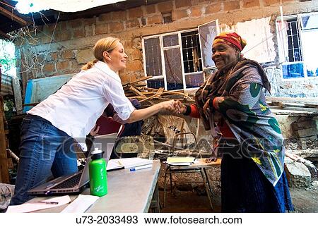 Stock Image - An HIV positive patient visiting an international mobile homeopathic clinic in Northern Tanzania.. Fotosearch