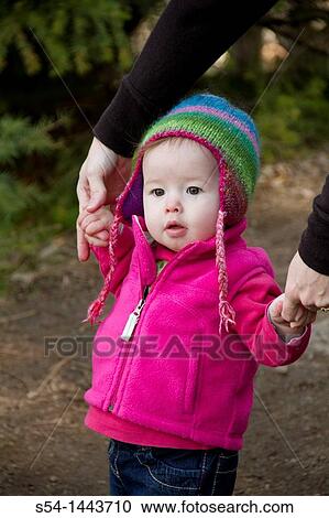 An infant girl outdoors. View Large Photo Image Stock Image - An infant girl outdoors.. Fotosearch