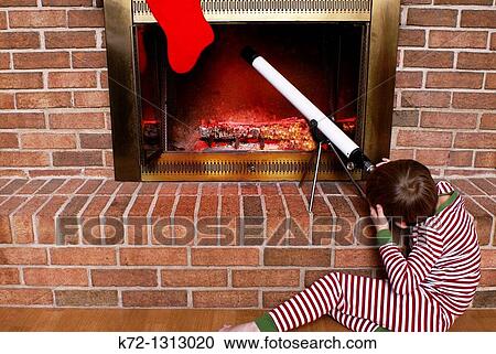 Stock Image - An ingenious way to look for Santa. Fotosearch