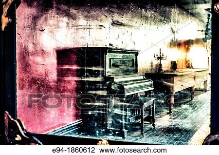 An old upright piano and its reflection in a mirror. View Large Photo Image Stock Image - An old upright piano and its reflection in a mirror.. Fotosearch