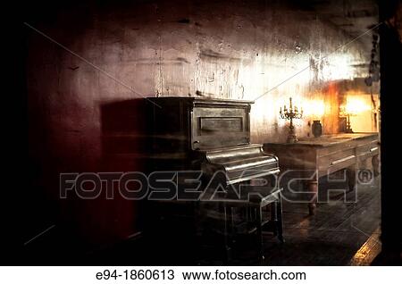 An old upright piano and its reflection in a mirror. View Large Photo Image Stock Image - An old upright piano and its reflection in a mirror.. Fotosearch