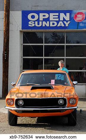 An orange? 69 Ford Mustang View Large Photo Image Picture - An orange? 69 Ford Mustang. Fotosearch