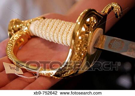 An ornate sword handle View Large Photo Image Stock Image - An ornate sword handle. Fotosearch