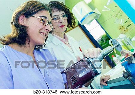 Stock Photograph - Analysis of femur, pathological anatomy at hospital. Fotosearch